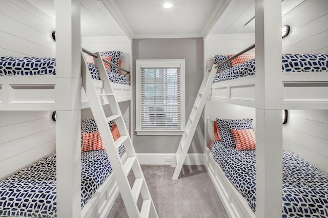 carpeted bedroom with ornamental molding