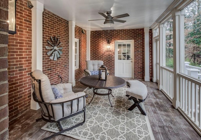 sunroom / solarium with ceiling fan