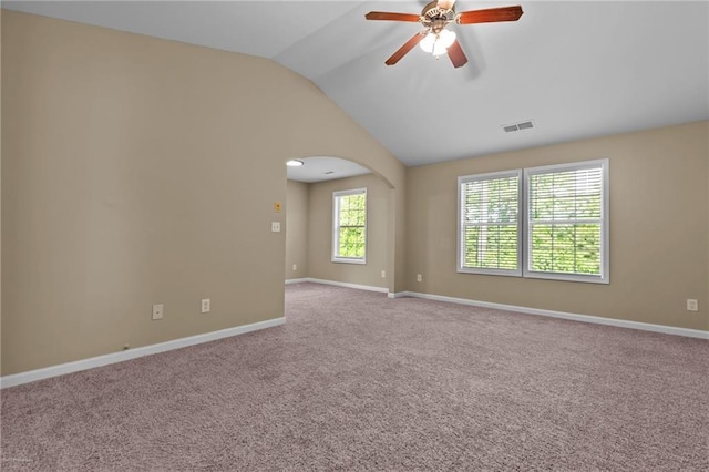 1137 Misty Valley Ct, Lawrenceville, GA 30045 - unfurnished room featuring lofted ceiling, ceiling fan, carpet flooring, and arched walkways