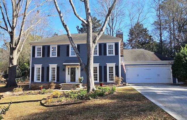 colonial-style house with a garage