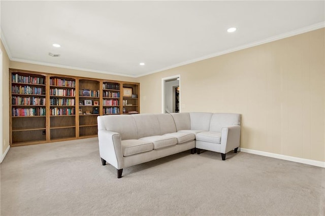 carpeted living room featuring ornamental molding