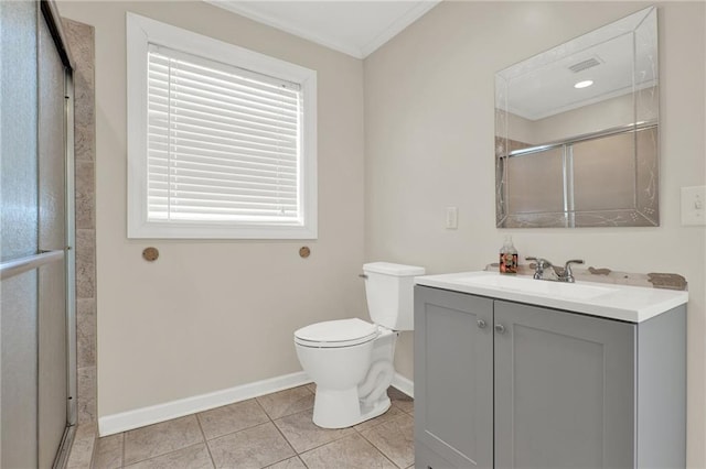 bathroom with toilet, vanity, tile patterned flooring, crown molding, and an enclosed shower