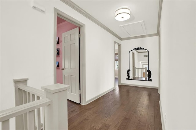 hall featuring dark wood-type flooring and ornamental molding