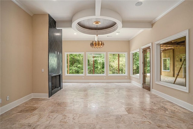 interior space with a fireplace, a chandelier, and crown molding