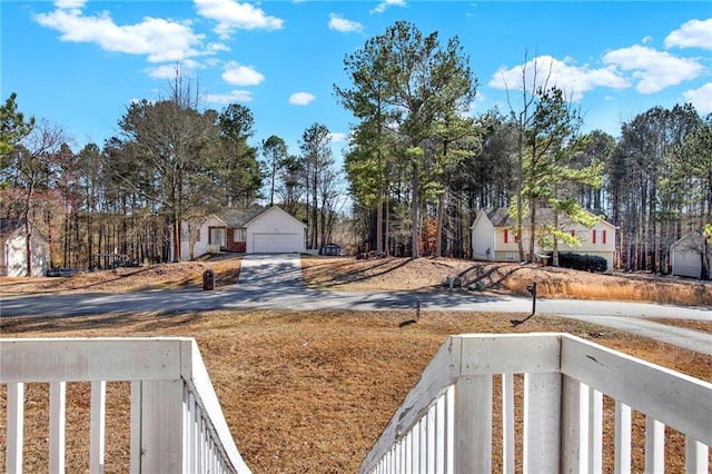 view of yard with a garage