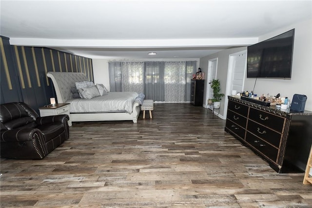 bedroom featuring dark wood-type flooring