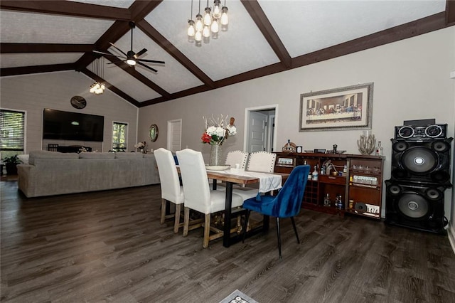 dining space featuring plenty of natural light, dark hardwood / wood-style floors, and beam ceiling