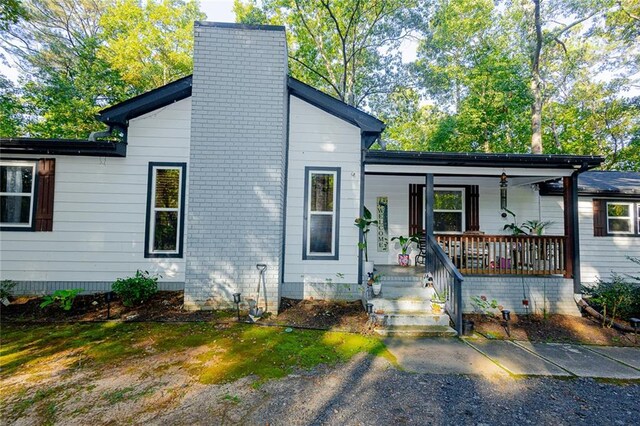 view of front of house featuring covered porch