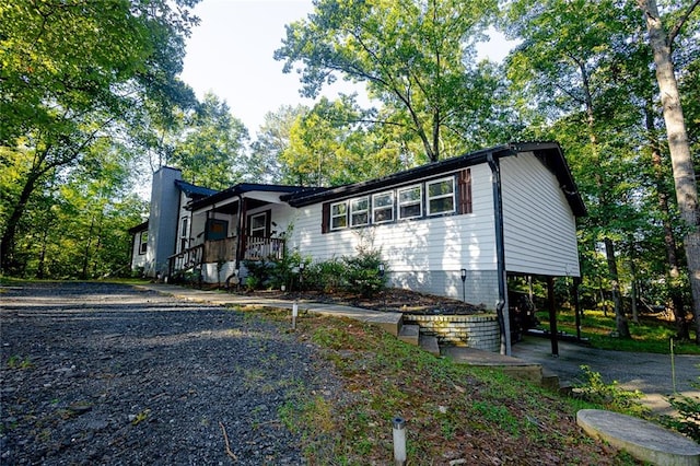 view of front of house featuring a carport