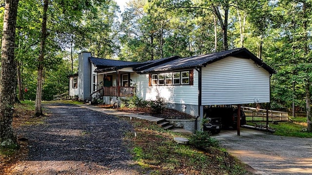 view of front of house with a carport