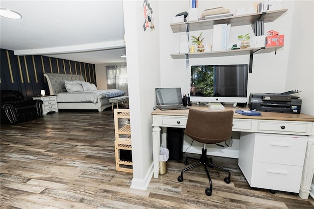 office featuring wood-type flooring and built in desk