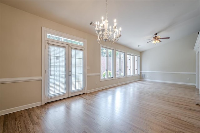 10280 Medridge Cir, Johns Creek, GA 30022 - empty room with french doors, wood finished floors, ceiling fan, vaulted ceiling, and baseboards