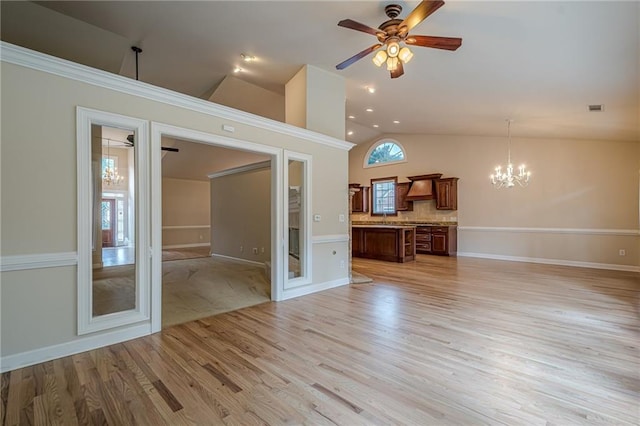 10280 Medridge Cir, Johns Creek, GA 30022 - unfurnished living room with a ceiling fan, a chandelier, light wood-style flooring, high vaulted ceiling, and baseboards