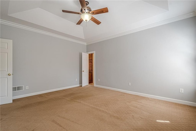 10280 Medridge Cir, Johns Creek, GA 30022 - spare room with light carpet, a tray ceiling, ornamental molding, a ceiling fan, and baseboards