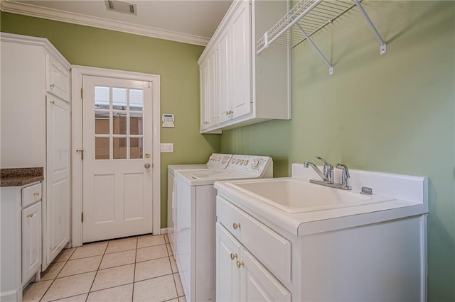 10280 Medridge Cir, Johns Creek, GA 30022 - laundry area featuring cabinet space, separate washer and dryer, ornamental molding, light tile patterned flooring, and baseboards