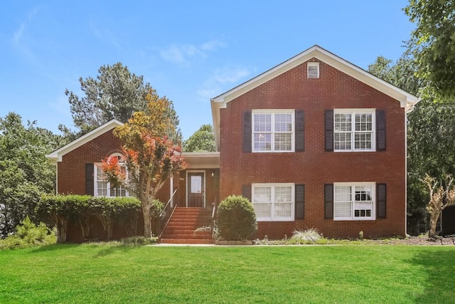 view of front facade with a front yard