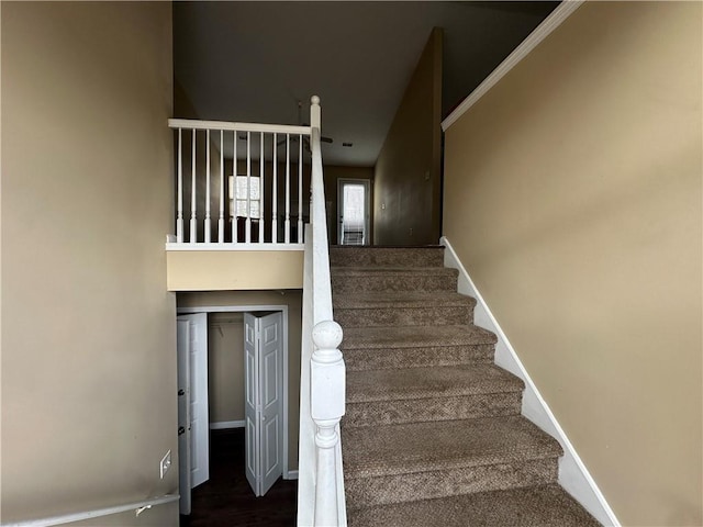 stairway with baseboards