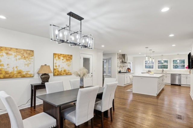 dining space with dark wood-type flooring