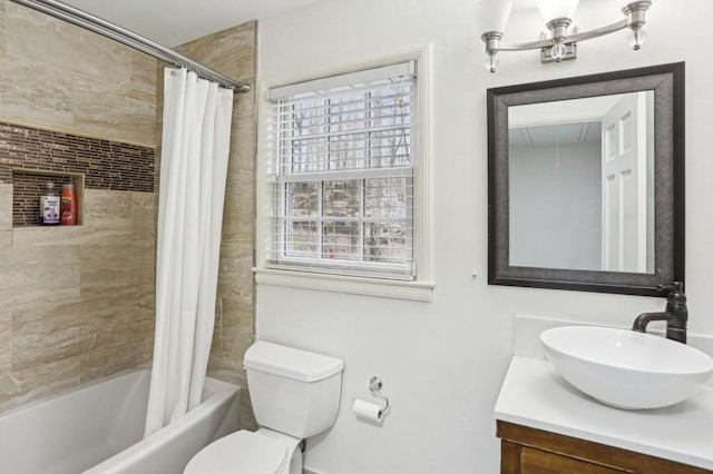 full bathroom featuring vanity, toilet, and shower / bath combo with shower curtain