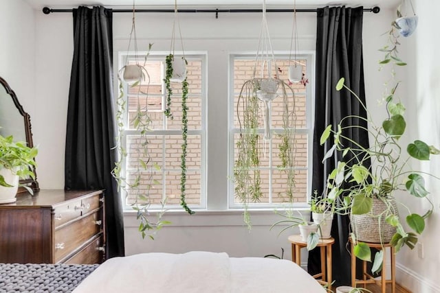 bedroom featuring multiple windows