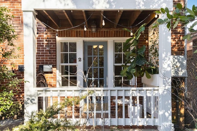 property entrance featuring french doors