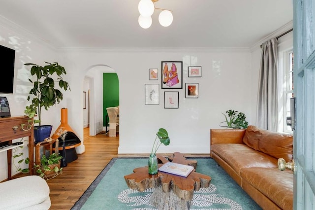 living room featuring ornamental molding and hardwood / wood-style floors