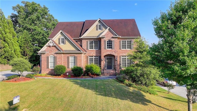 1755 Riverpark Dr, Dacula, GA 30019 - view of front of property featuring brick siding and a front yard