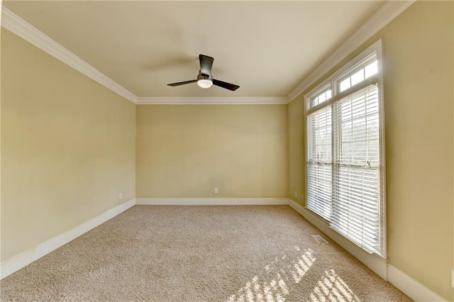 1755 Riverpark Dr, Dacula, GA 30019 - spare room featuring ornamental molding, a ceiling fan, and light carpet