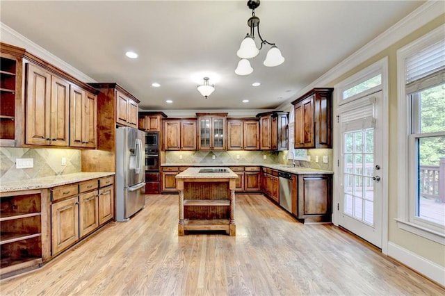 1755 Riverpark Dr, Dacula, GA 30019 - kitchen featuring open shelves, stainless steel appliances, ornamental molding, light wood-type flooring, and light stone counters