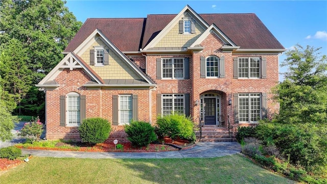 1755 Riverpark Dr, Dacula, GA 30019 - view of front of home featuring brick siding and a front yard