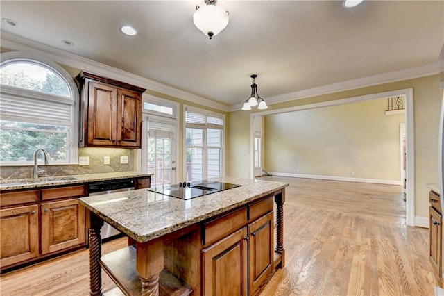 1755 Riverpark Dr, Dacula, GA 30019 - kitchen featuring stainless steel dishwasher, black electric stovetop, brown cabinets, ornamental molding, and recessed lighting