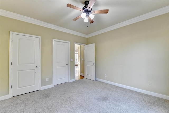 1755 Riverpark Dr, Dacula, GA 30019 - unfurnished bedroom featuring carpet flooring, crown molding, and a ceiling fan