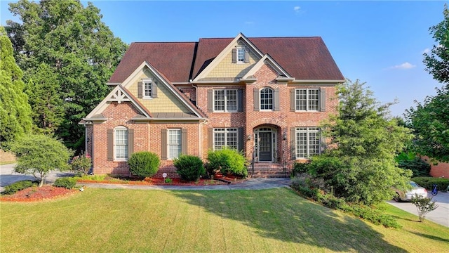 1755 Riverpark Dr, Dacula, GA 30019 - view of front of property with brick siding and a front yard