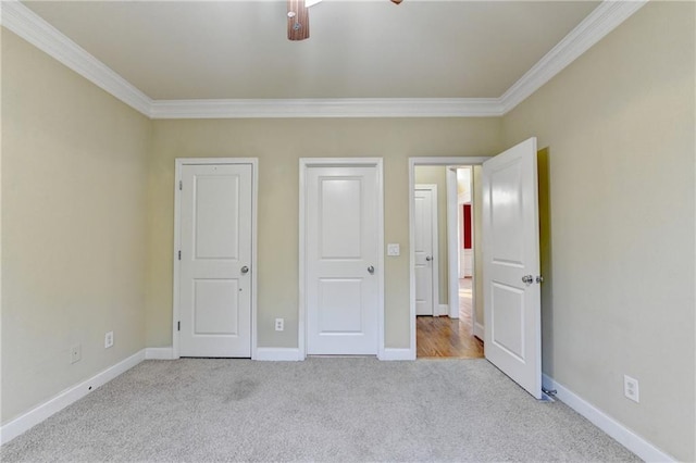 1755 Riverpark Dr, Dacula, GA 30019 - unfurnished bedroom with carpet floors, crown molding, and ceiling fan