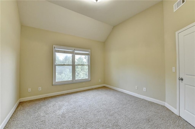 1755 Riverpark Dr, Dacula, GA 30019 - spare room with carpet flooring and vaulted ceiling
