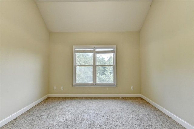 1755 Riverpark Dr, Dacula, GA 30019 - carpeted spare room with baseboards and lofted ceiling