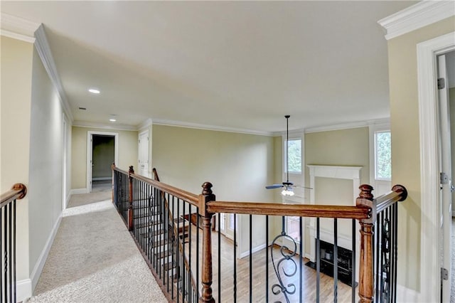 1755 Riverpark Dr, Dacula, GA 30019 - hallway featuring an upstairs landing, ornamental molding, and recessed lighting