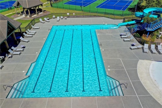 1755 Riverpark Dr, Dacula, GA 30019 - community pool with a water slide and a gazebo