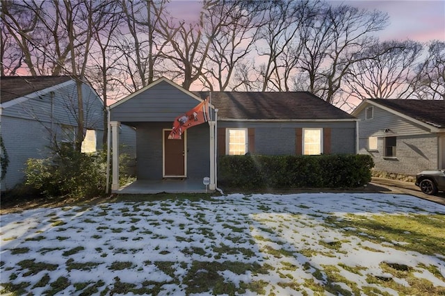 view of front of home with brick siding