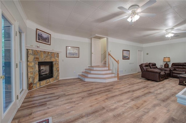 354 Starcross Ln, Jasper, GA 30143 - living room with ceiling fan, stairway, and crown molding
