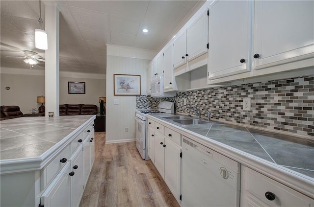 354 Starcross Ln, Jasper, GA 30143 - kitchen with a sink, white cabinetry, white appliances, tile countertops, and ornamental molding