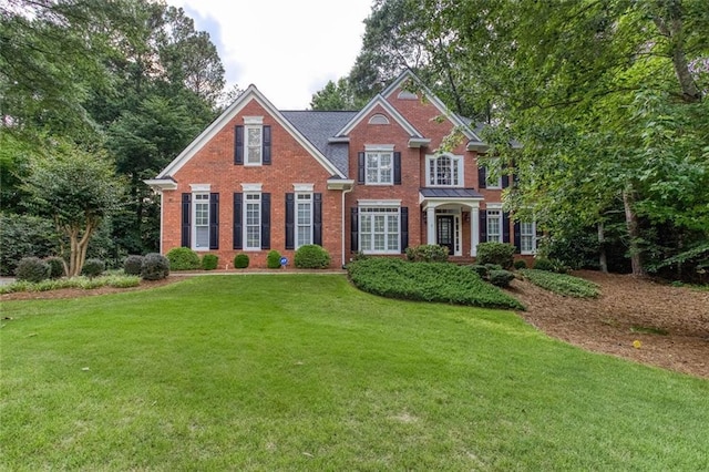5010 Bonnie Way, Roswell, GA 30075 - view of front of property with brick siding and a front yard