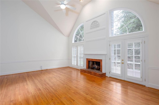 5010 Bonnie Way, Roswell, GA 30075 - unfurnished living room with a ceiling fan, light wood finished floors, high vaulted ceiling, and a fireplace