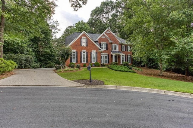 5010 Bonnie Way, Roswell, GA 30075 - georgian-style home with brick siding and a front lawn