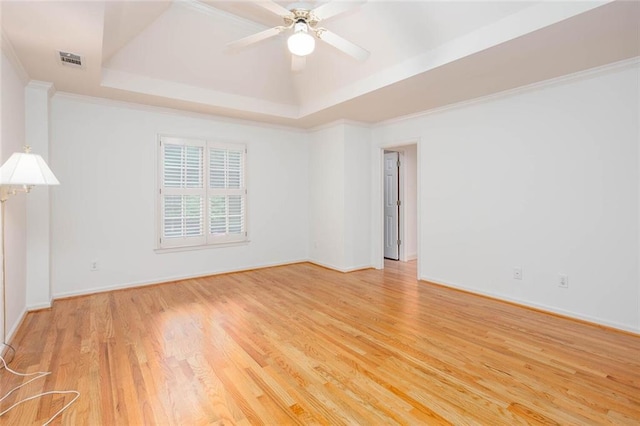 5010 Bonnie Way, Roswell, GA 30075 - spare room featuring a raised ceiling, wood finished floors, a ceiling fan, baseboards, and ornamental molding