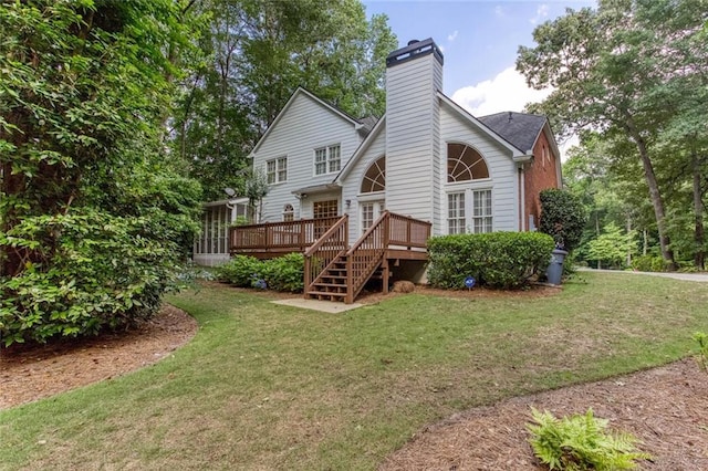5010 Bonnie Way, Roswell, GA 30075 - rear view of property featuring a chimney, a deck, and a lawn