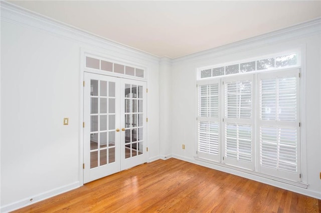 5010 Bonnie Way, Roswell, GA 30075 - empty room featuring french doors, wood finished floors, ornamental molding, and baseboards