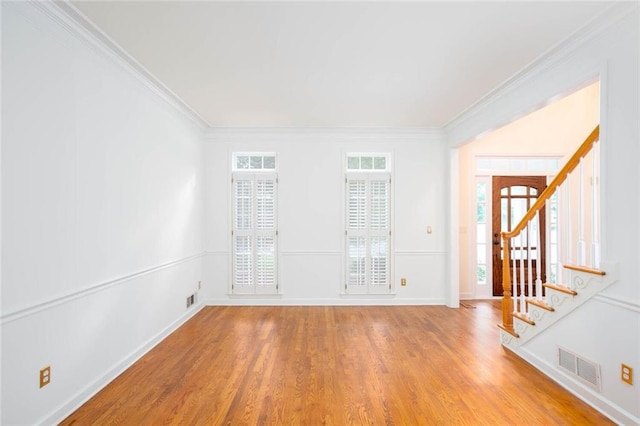 5010 Bonnie Way, Roswell, GA 30075 - spare room with wood finished floors, ornamental molding, baseboards, and stairway