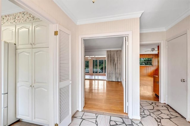 hallway featuring crown molding