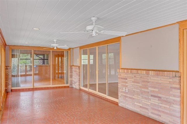 interior space with a ceiling fan and wooden ceiling